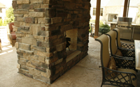 Shannon Weatheredge and Teelin Bay Field Stone Veneer Exterior Fireplace